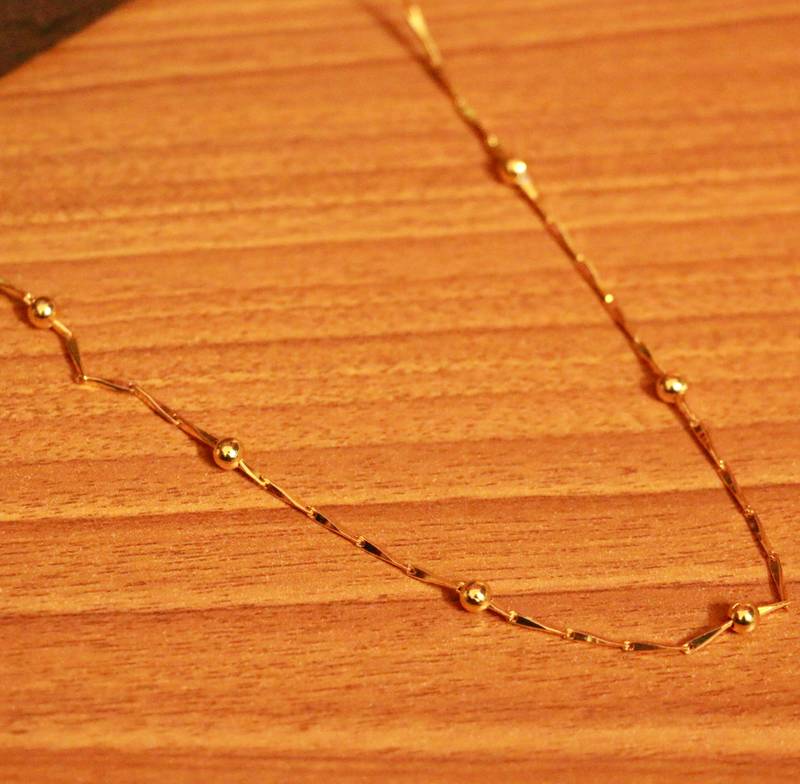 ARTIFICIAL GOLD PLATED BALL PATTERN RICE CHAIN Sanvi Jewels