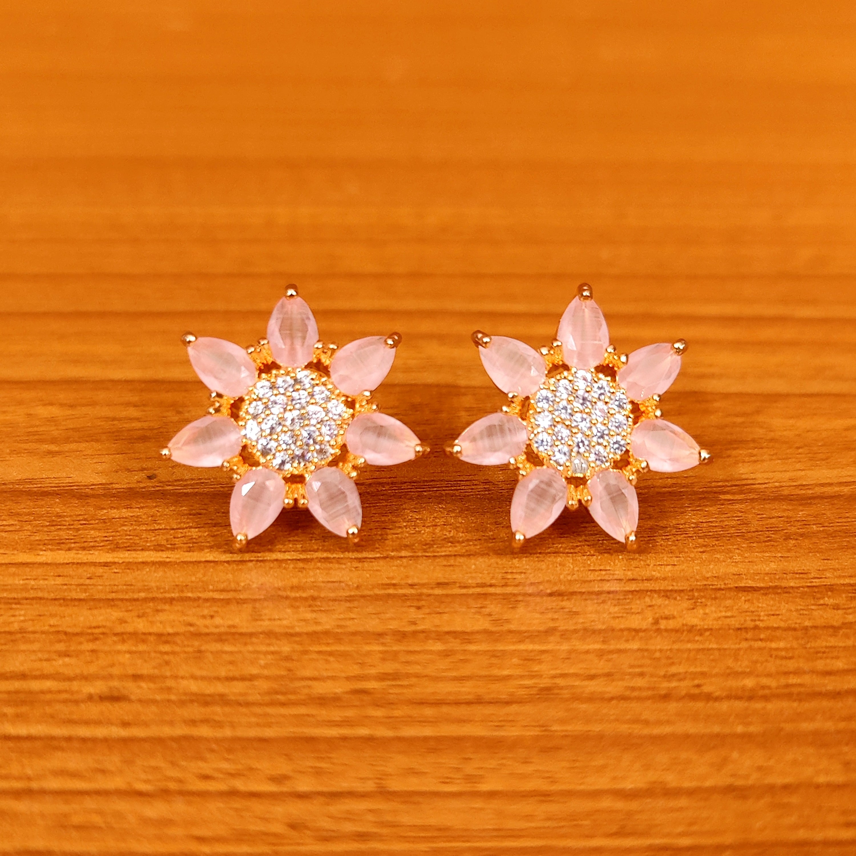 BOTTLE GREEN COLOUR CZ STUDDED FLOWER STUDS