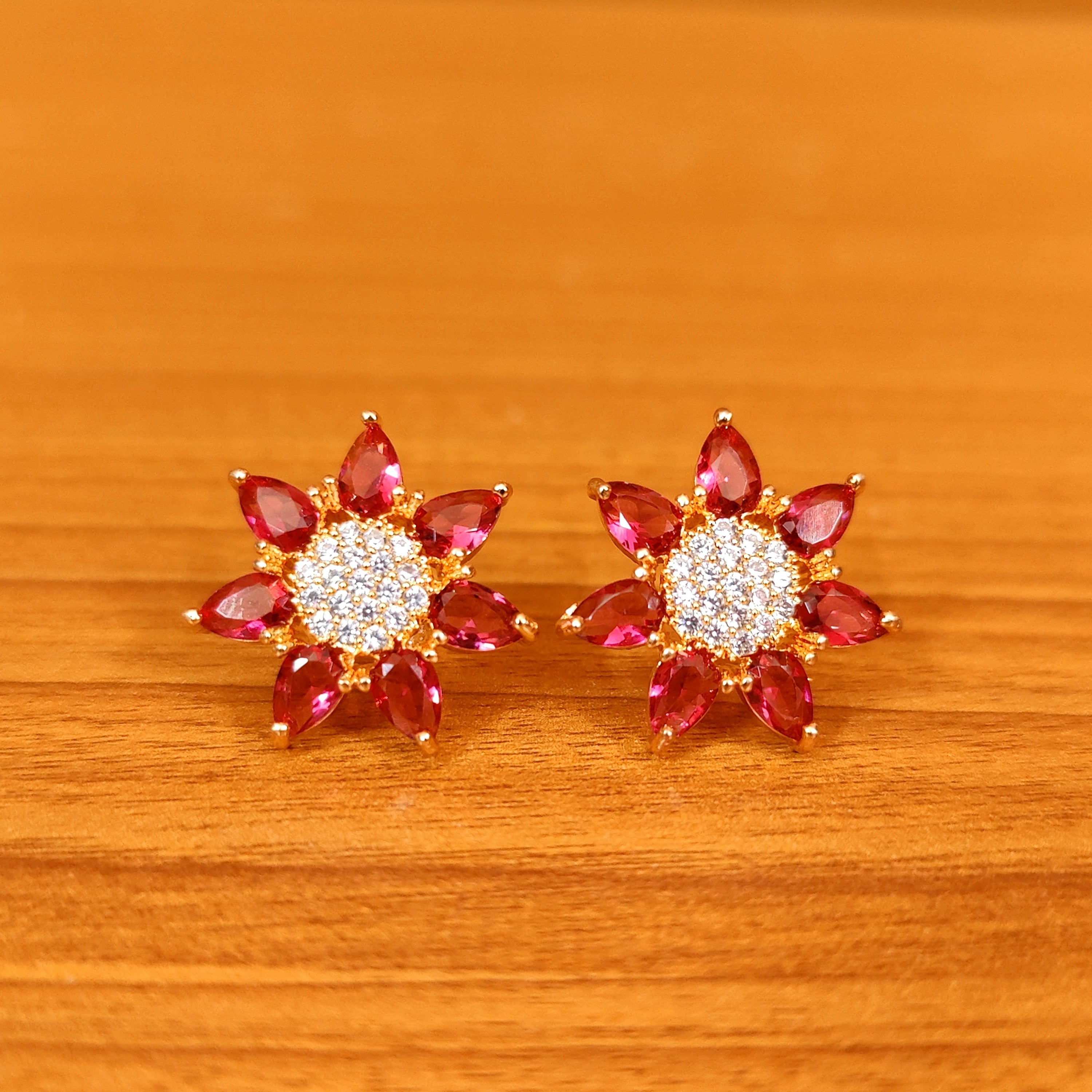 BOTTLE GREEN COLOUR CZ STUDDED FLOWER STUDS