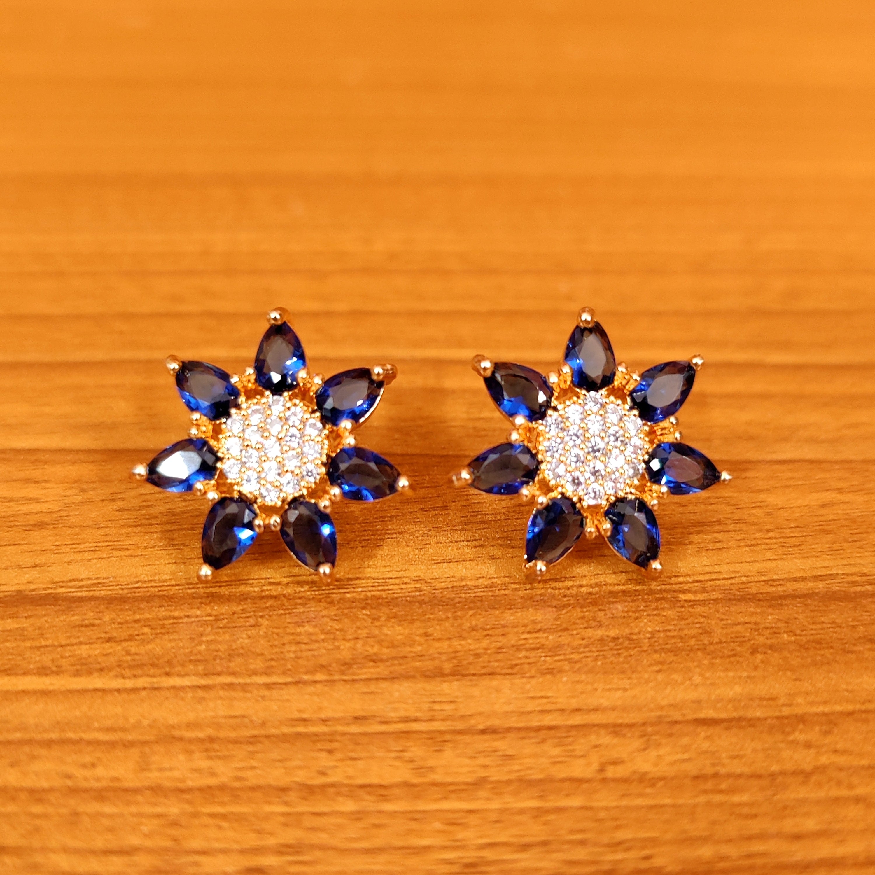 BOTTLE GREEN COLOUR CZ STUDDED FLOWER STUDS