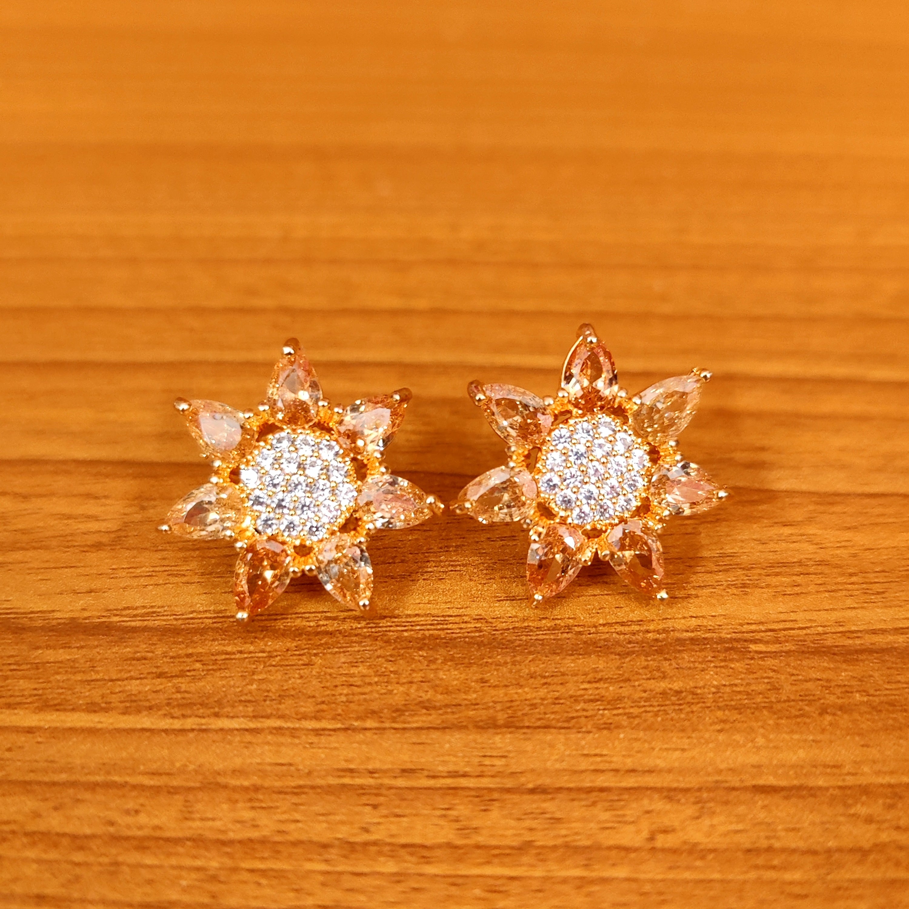 BOTTLE GREEN COLOUR CZ STUDDED FLOWER STUDS