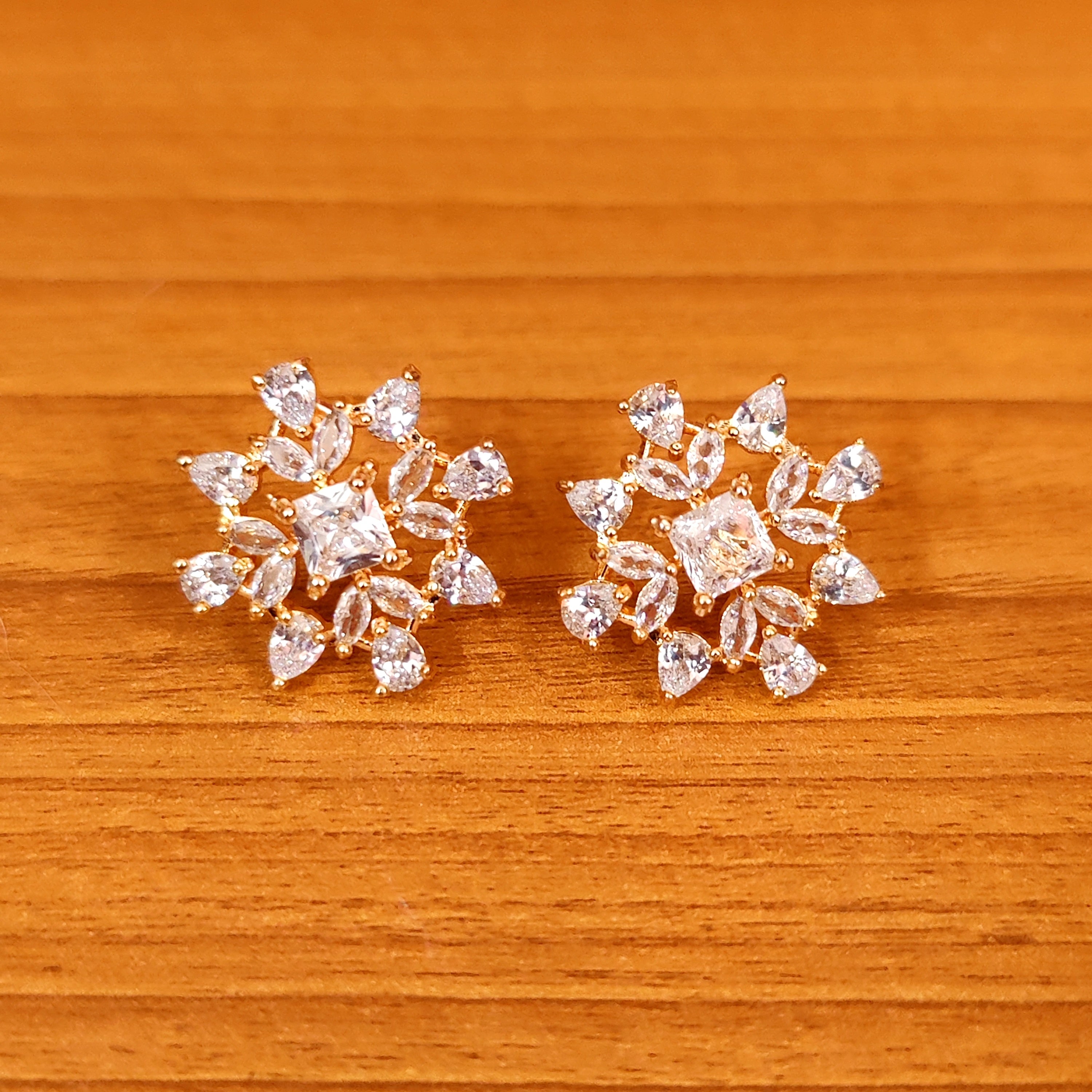 DIAMOND LOOK GOLD PLATED CZ STUDDED EARRINGS