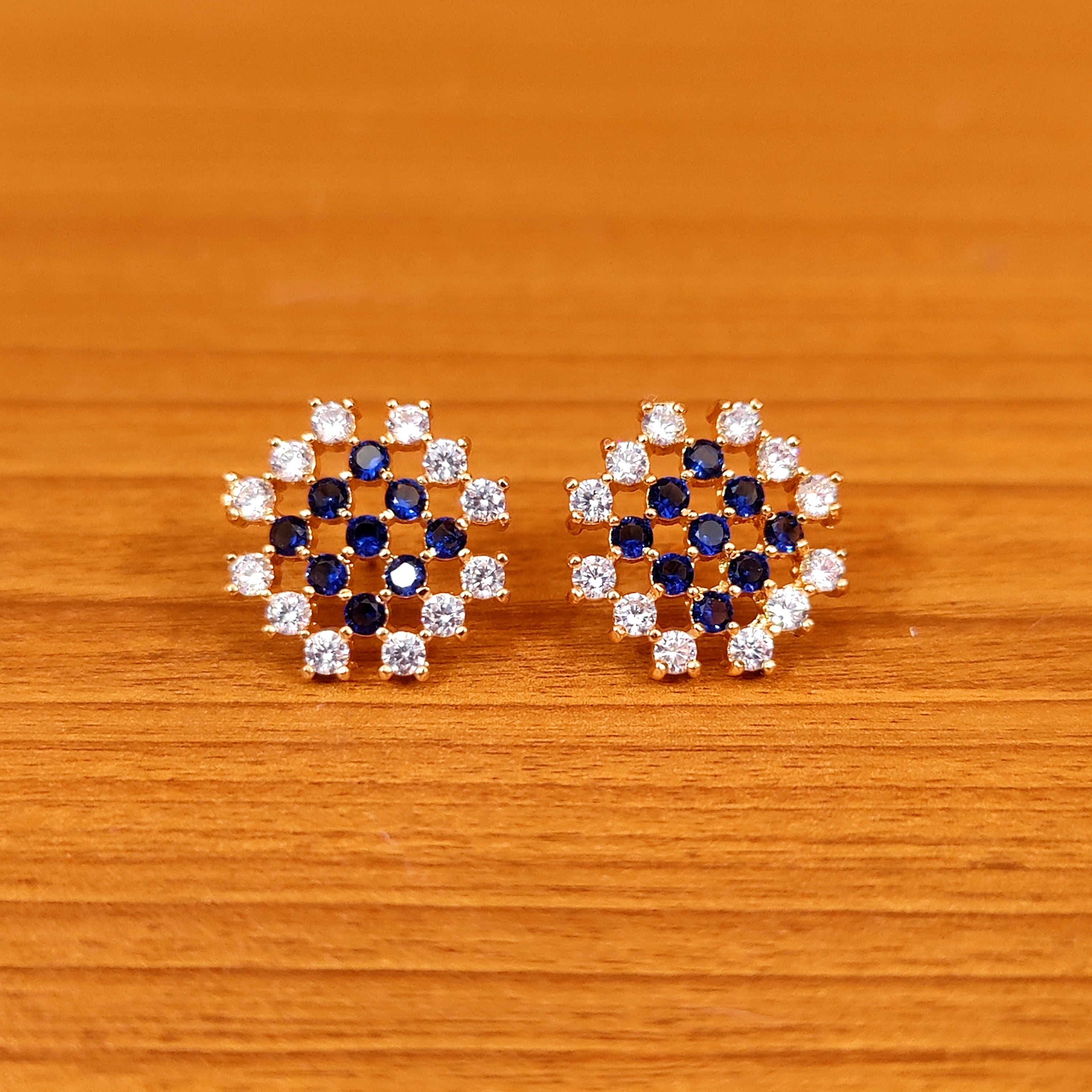 PINKISH RUBY CZ STUDDED DIAMOND LOOK STUDS