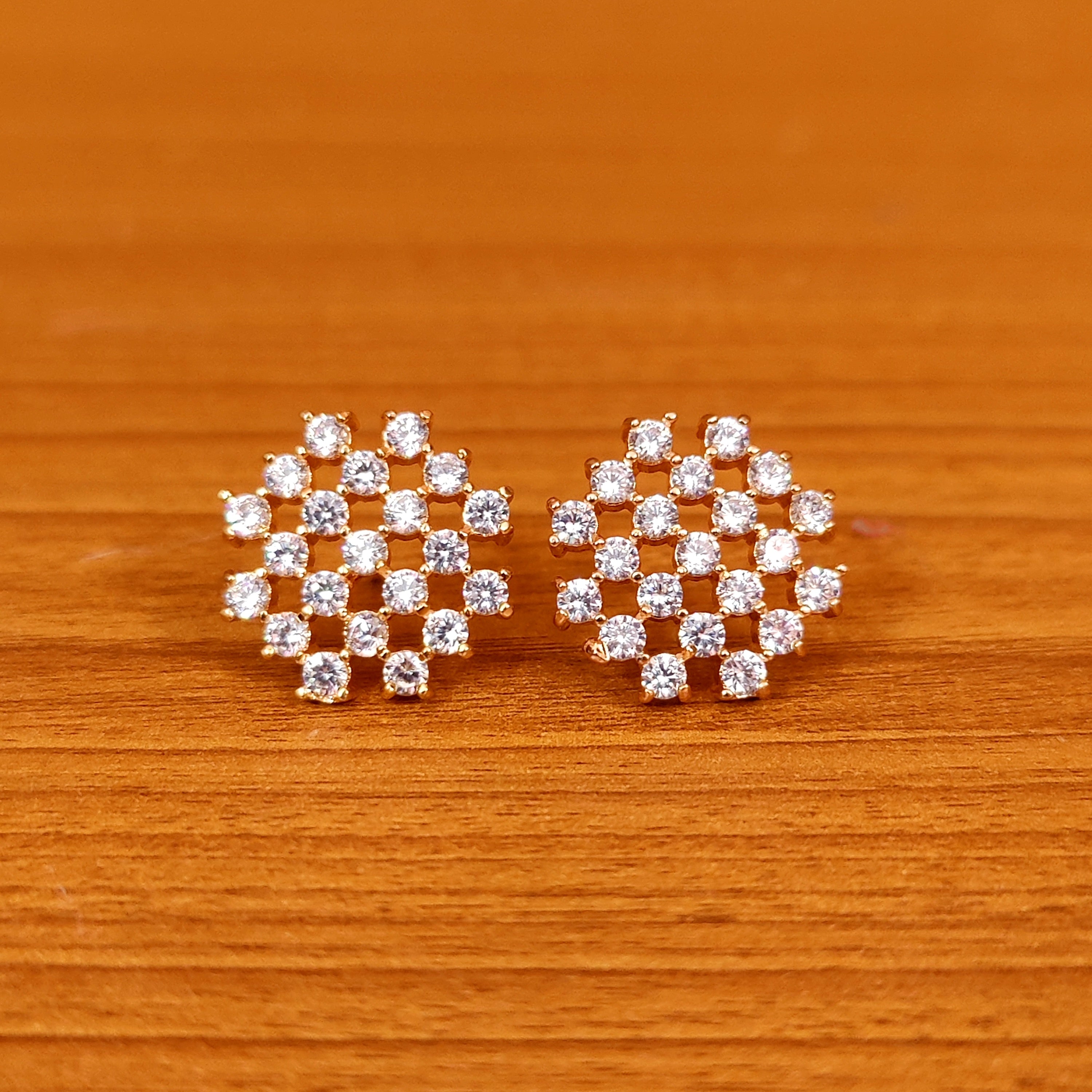 PINKISH RUBY CZ STUDDED DIAMOND LOOK STUDS