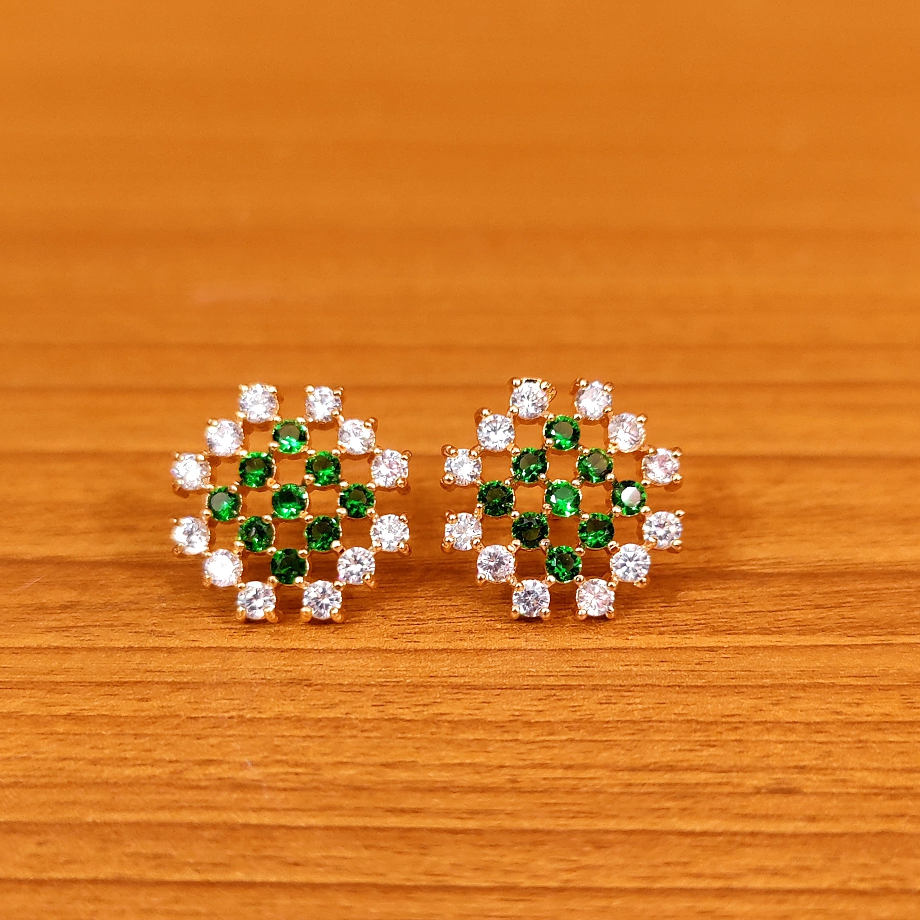 PINKISH RUBY CZ STUDDED DIAMOND LOOK STUDS