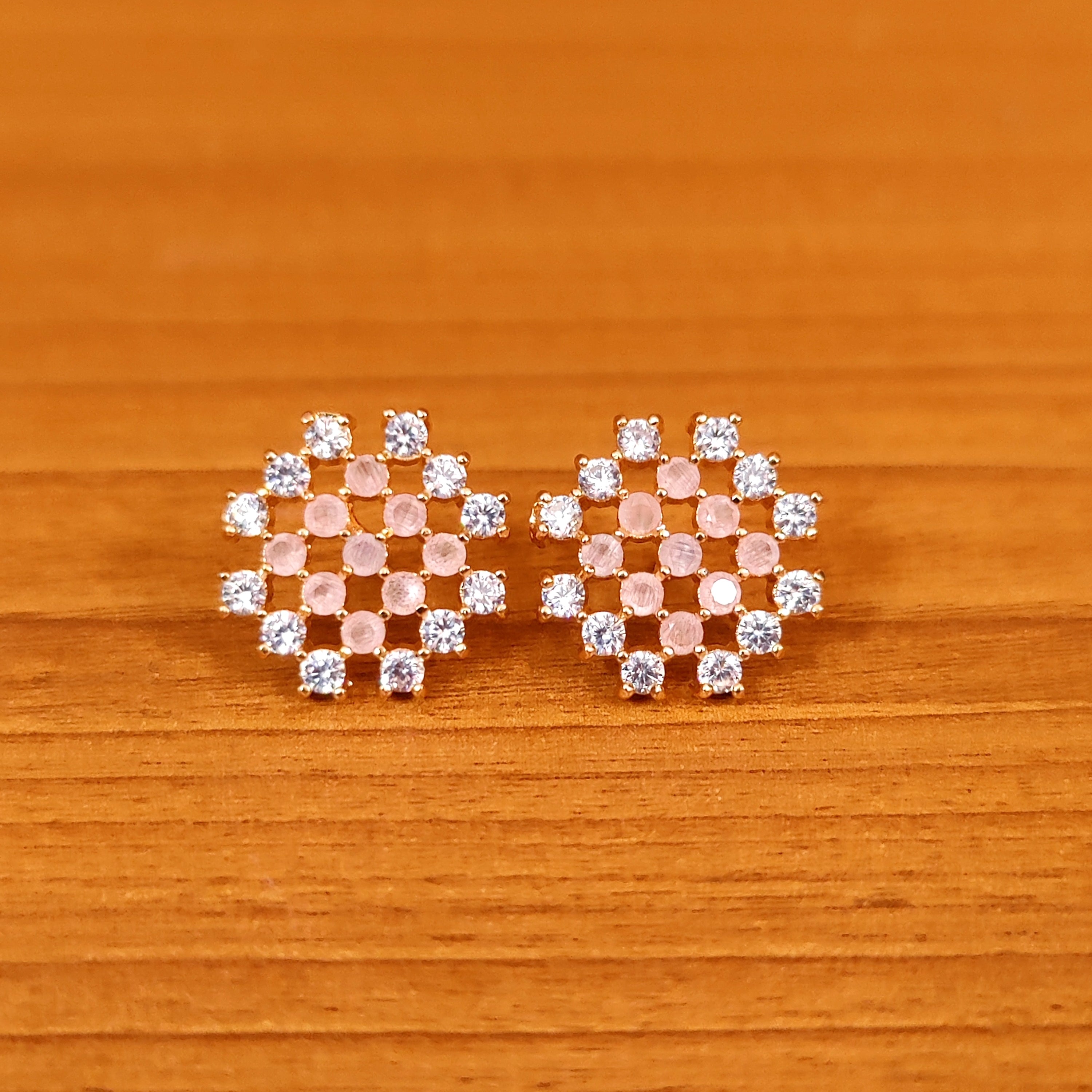 PINKISH RUBY CZ STUDDED DIAMOND LOOK STUDS