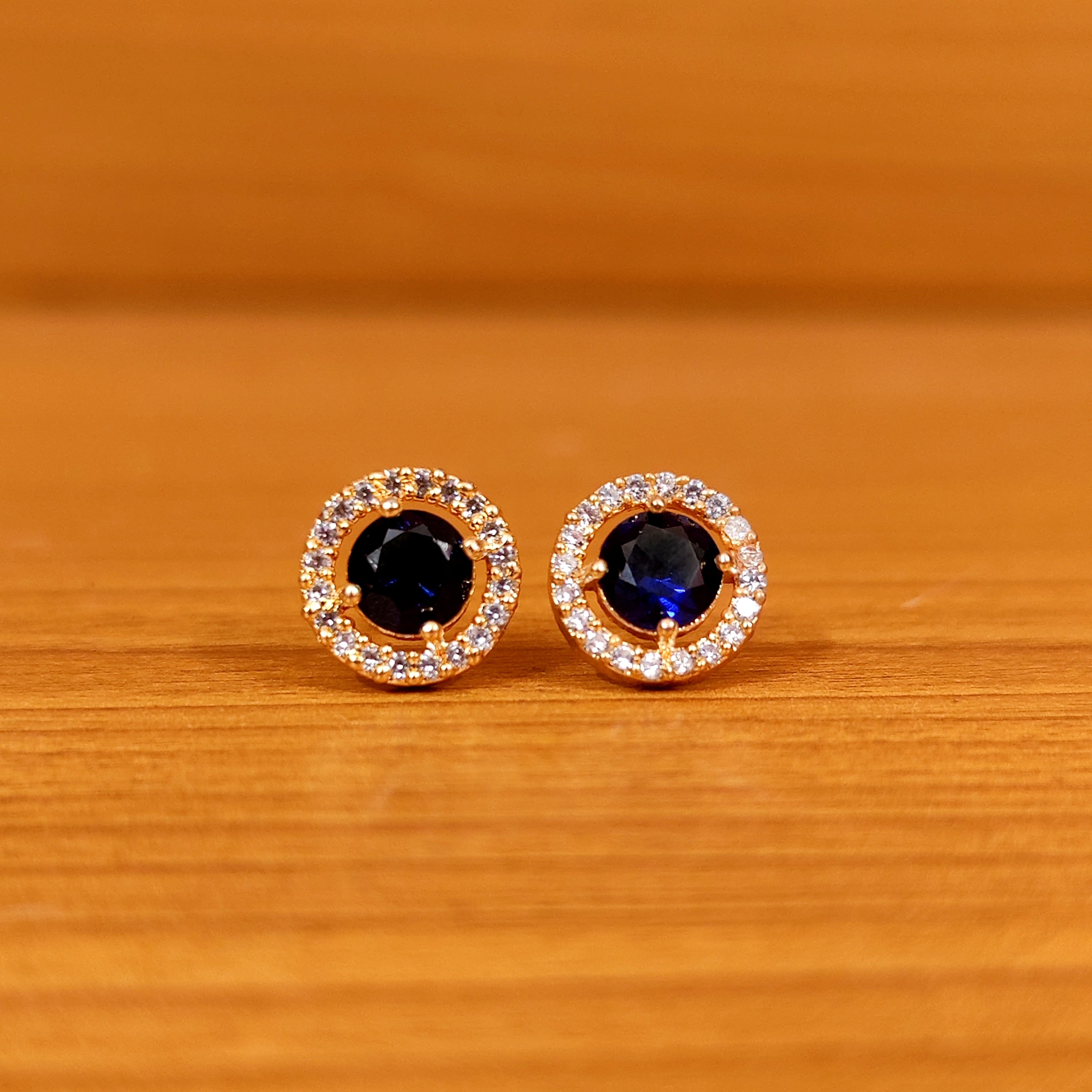 PINKISH RUBY ROUND SHAPED SOLITAIRE LOOK STUDS
