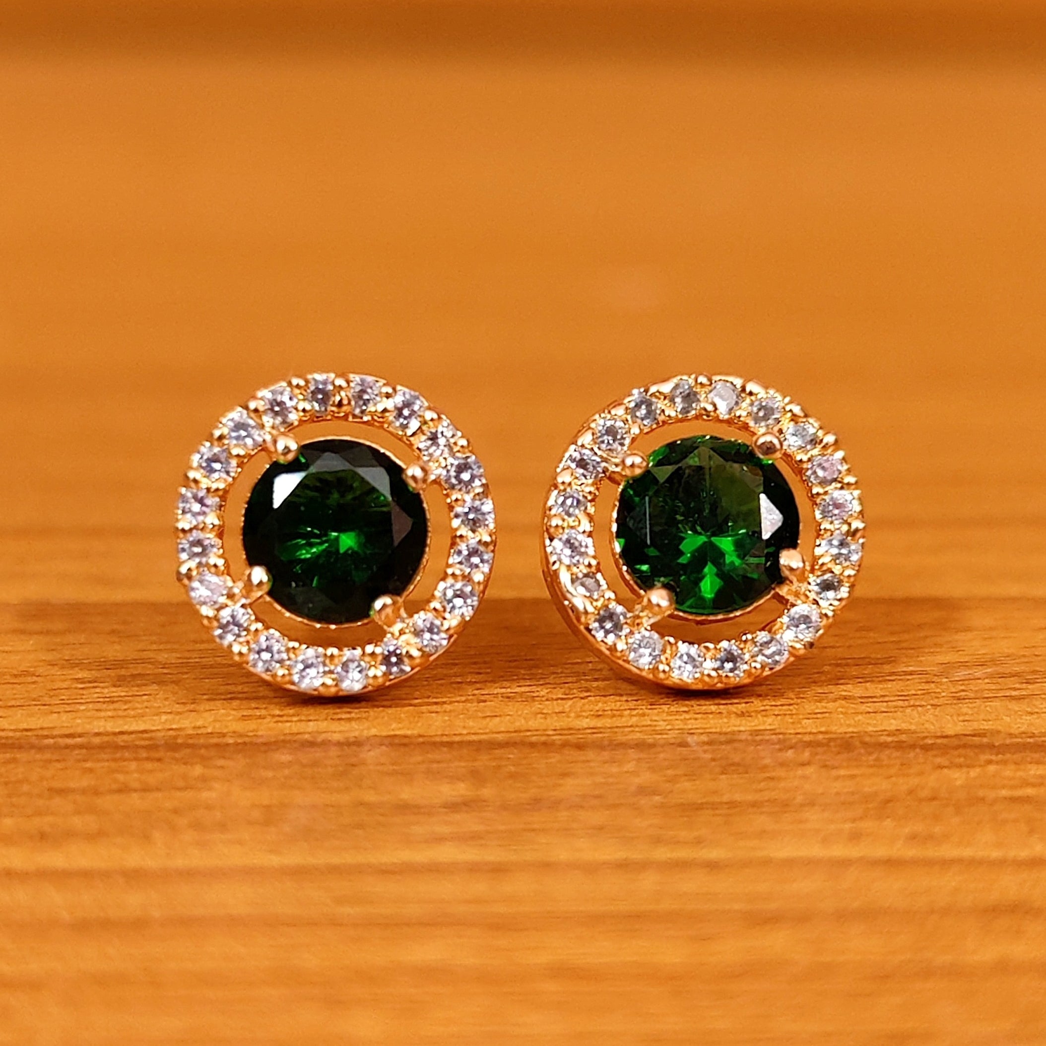 PINKISH RUBY ROUND SHAPED SOLITAIRE LOOK STUDS