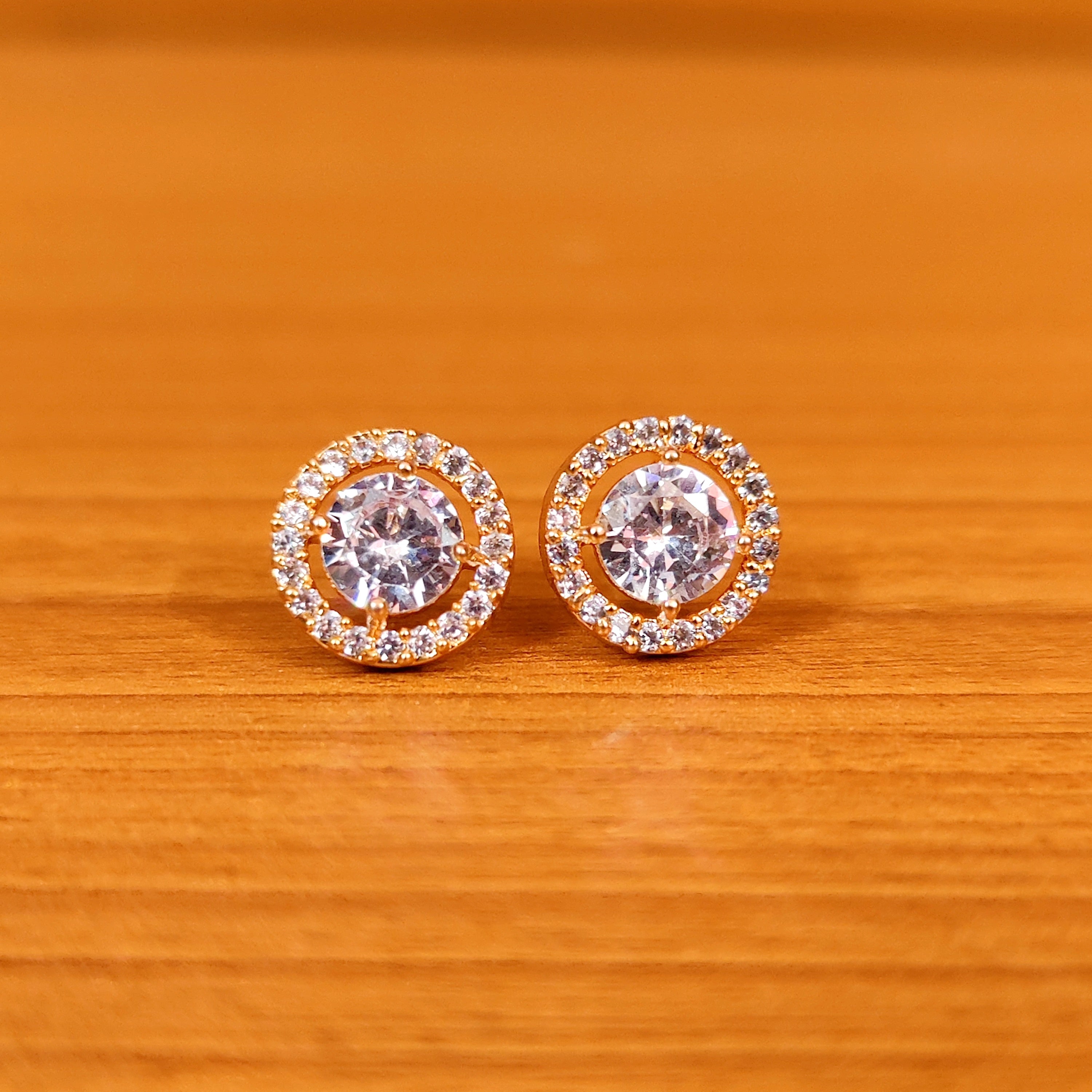 PINKISH RUBY ROUND SHAPED SOLITAIRE LOOK STUDS