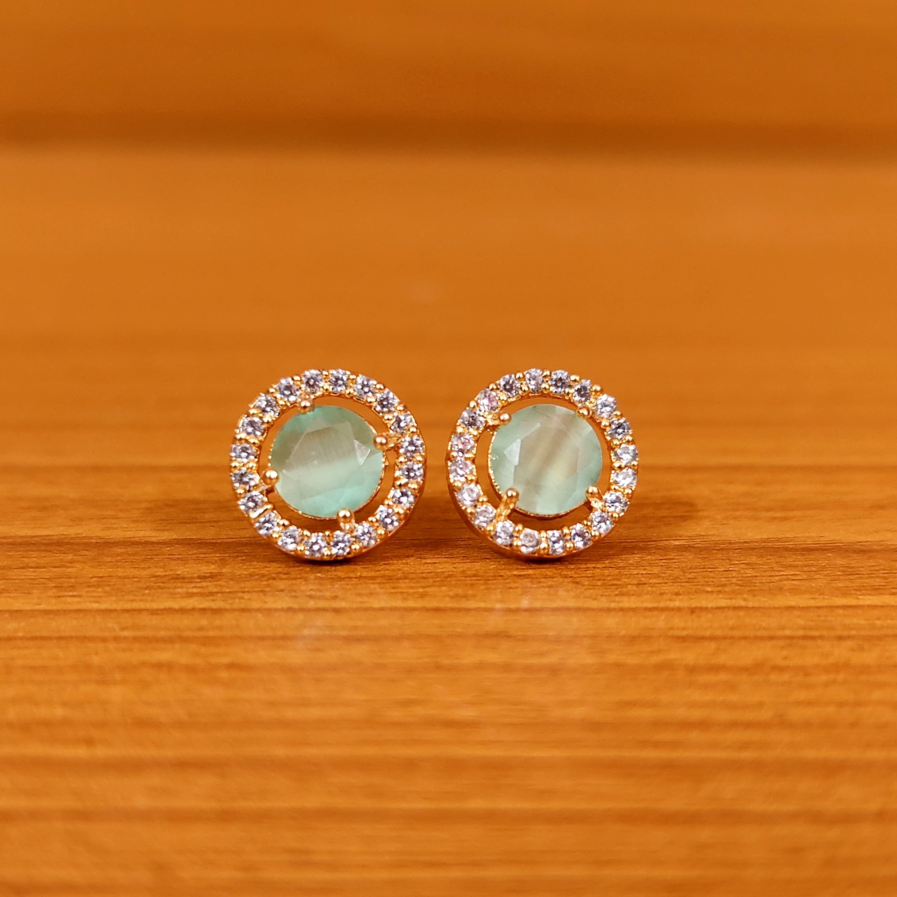 PINKISH RUBY ROUND SHAPED SOLITAIRE LOOK STUDS