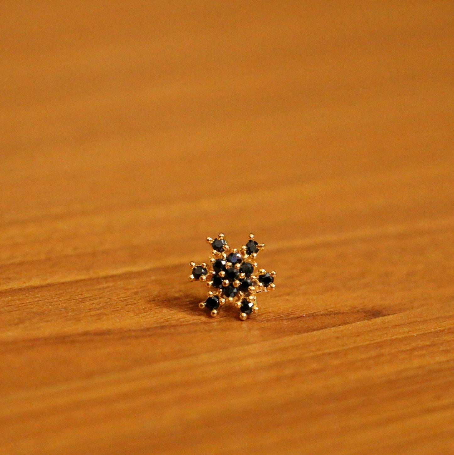 Black Cz Studded Star Pattern Piercing Nose Ring