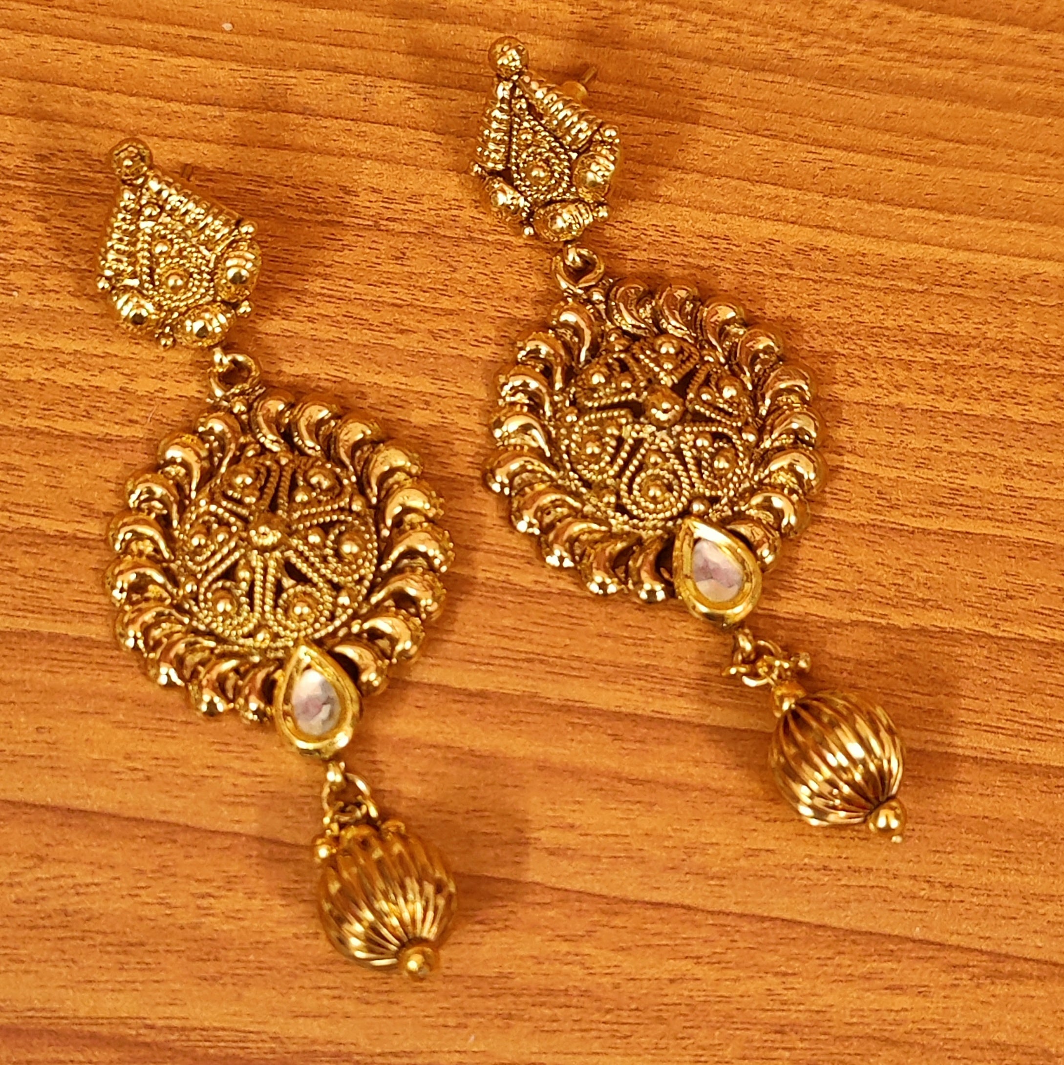 Statement flower black Ethnic Antique Gold tone earrings at ₹1650 | Azilaa
