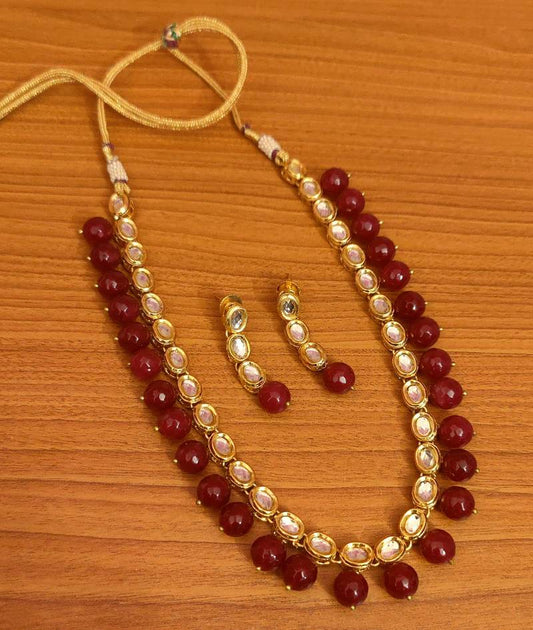 OVAL SHAPED RUBY KUNDAN MEENAKARI SINGLE LINE NECKLACE SET