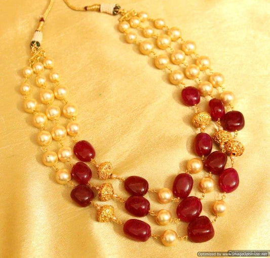 Semi precious ruby and pearl gold beads necklace